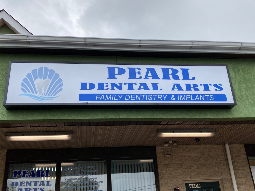 Office sign outside of the building